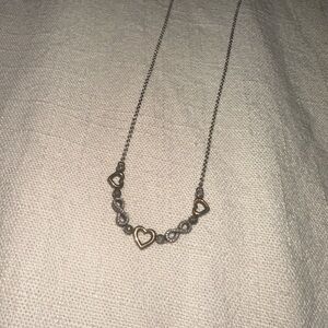 Heart infinity necklace with adjustable height silver and gold